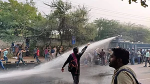 Students stage protest outside JNU over fee hike, dress code