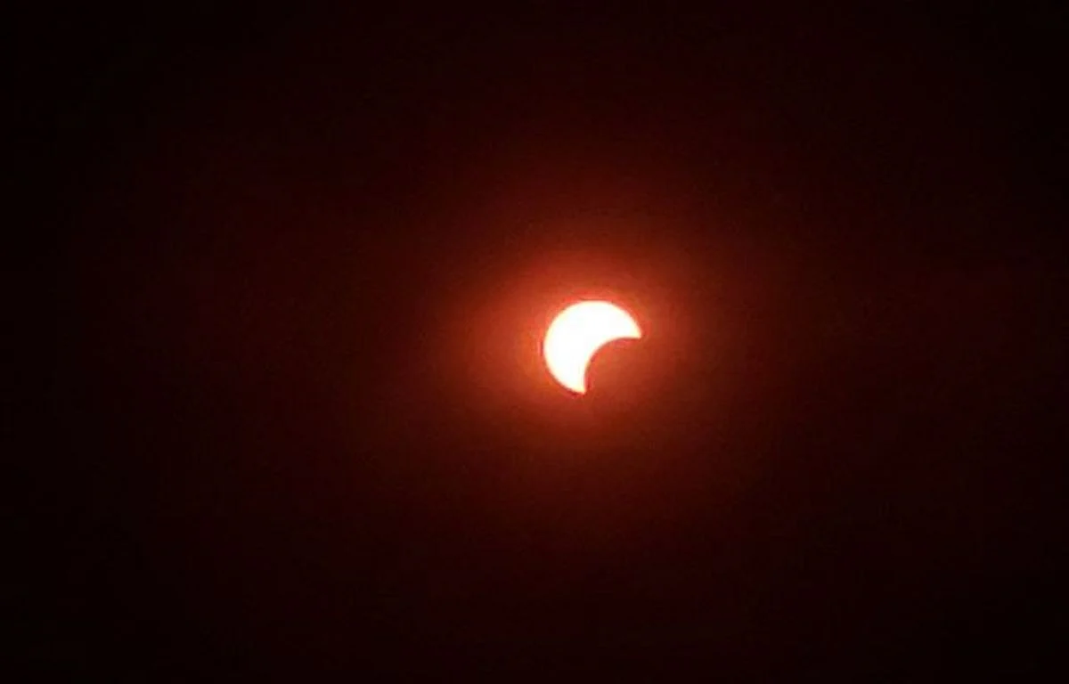 Full solar eclipses turn the sun a shade of red in Afghanistan