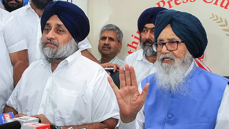 SAD chief Sukhbir Badal with father Parkash Singh Badal (File photo)