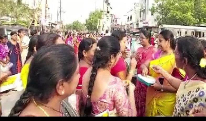 Women in Jaggaiahpeta in Andhra Pradesh’s Krishna district distribute sweets after the news of killing by police of four rape accused of Hyderabad vet came out.