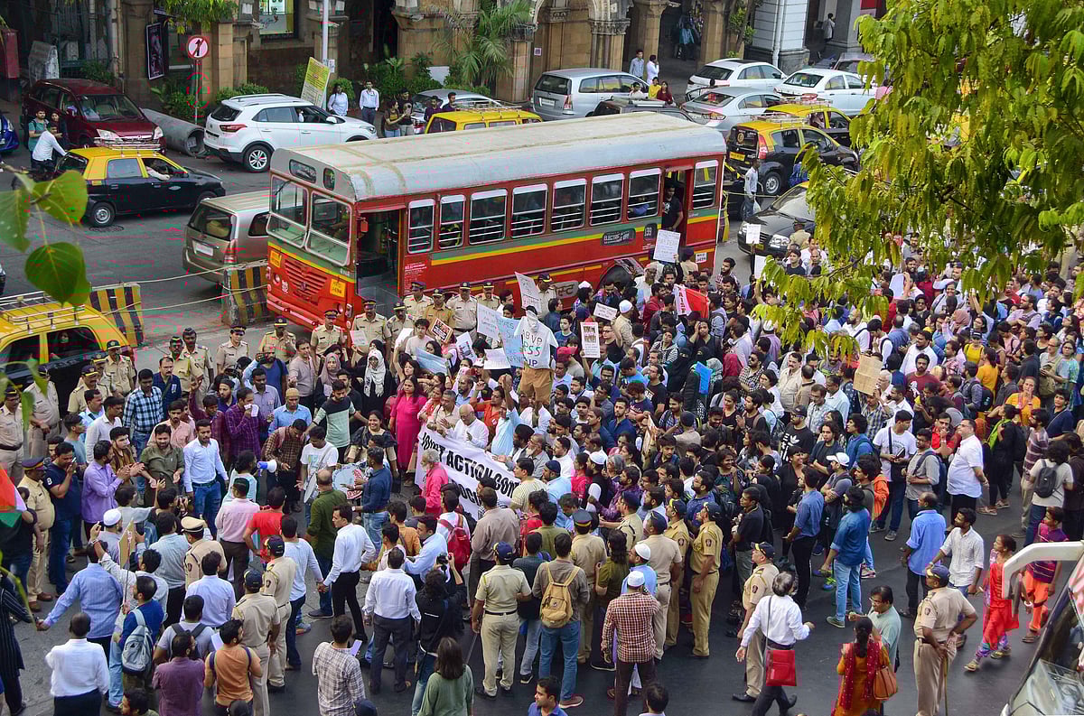 Students and activists shout slogans as they participate in a protest against the alleged violence on JNU students Sunday evening, during a rally from Hutatma Chowk to Gateway of India, in Mumbai, Monday, Jan. 6, 2020. (PTI Photo)