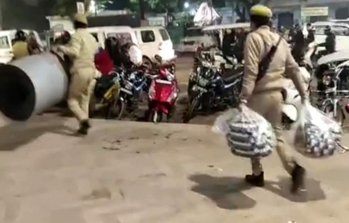 UP police taking away blankets from women protesters on Saturday night (Photo courtesy- social media)