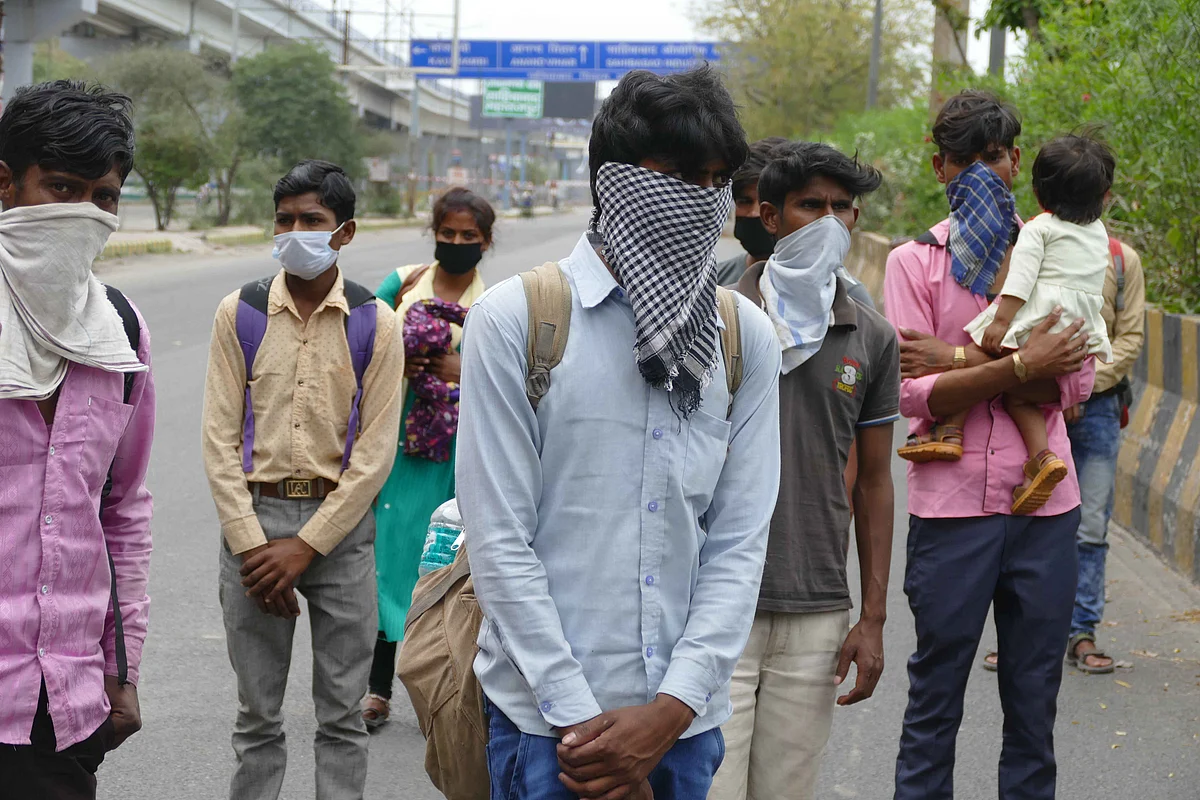 IN PHOTOS| Lockdown woes: Daily wagers migrate bare foot with empty stomach