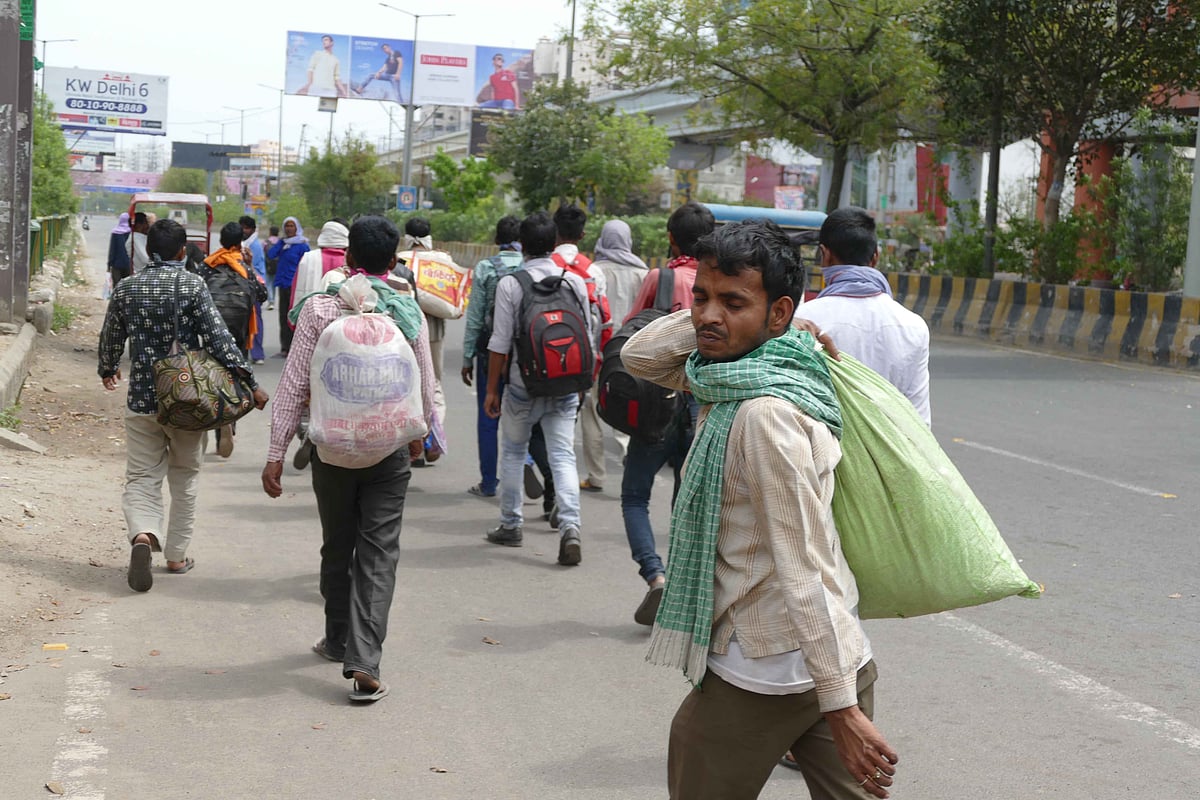 Going back home on foot near Kaushambi on Thursday