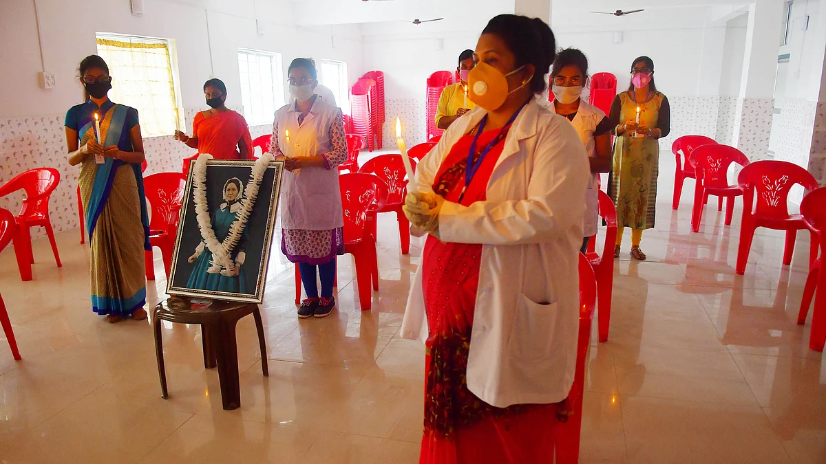 The Faculty and students of Institute of Nursing Science, Agartala offering prayers on International Nurses day (Photo by Abhishek Saha)