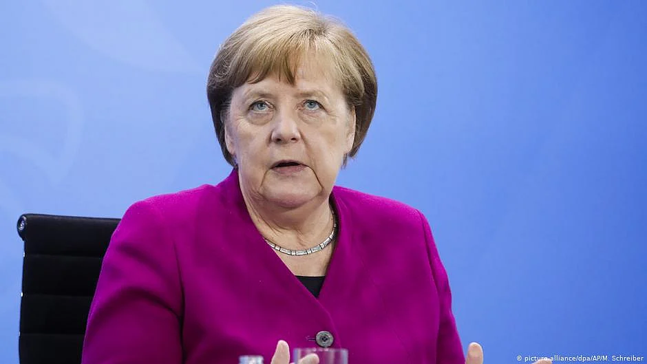 Germany lifts more restrictions, Merkel urges caution