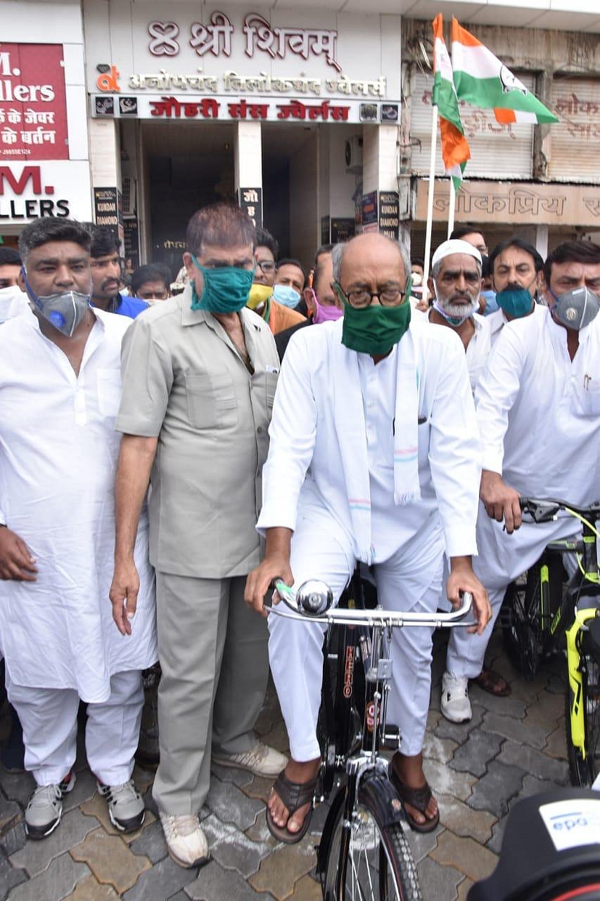 MP Congress protests against fuel price hike; police books Digvijay Singh for leading bicycle rally