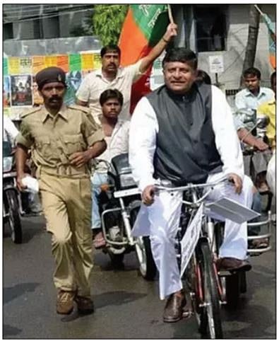 Ravi Shankar Prasad during a protest against hike in fuel price before 2014