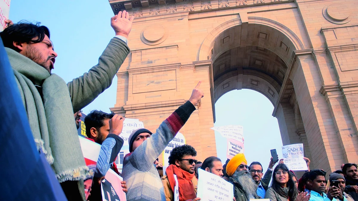 People protest against the Citizenship Amendment Act (CAA) and National Register of Citizens (NRC), at India Gate in New Delhi on January 1, 2020. (Photo: IANS)