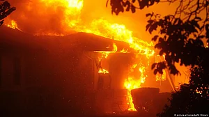 California wildfire explodes, burning across 25 miles in day