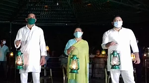 RJD protests against Nitish Kumar govt by lighting lamps