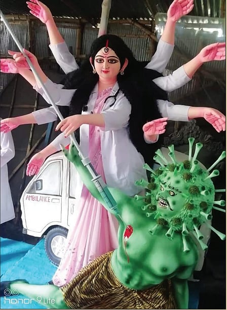 Crowds missing but Kolkata greets ‘Ma Durga’ as caregiver and migrant mother...