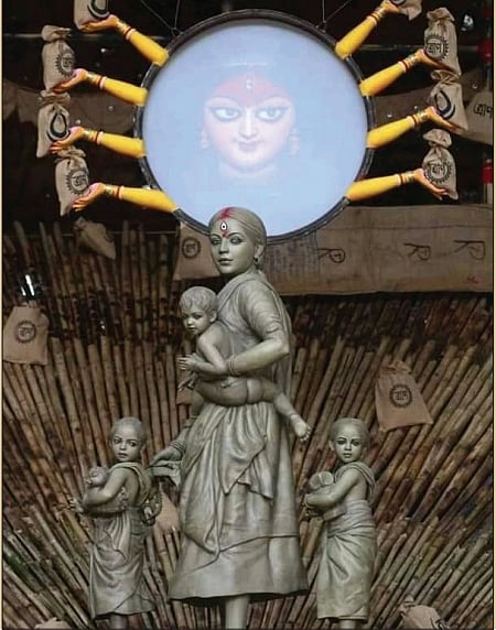 Crowds missing but Kolkata greets ‘Ma Durga’ as caregiver and migrant mother...