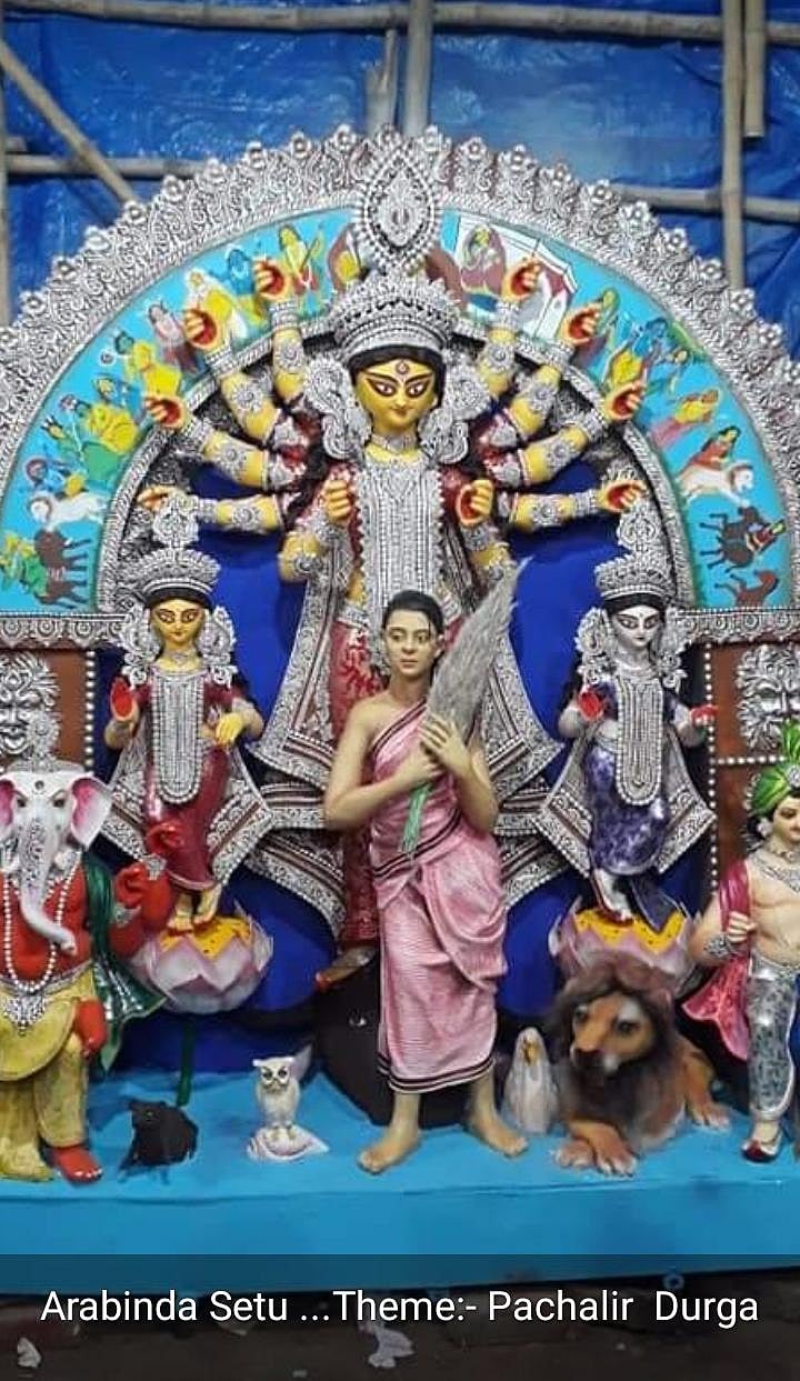 Crowds missing but Kolkata greets ‘Ma Durga’ as caregiver and migrant mother...