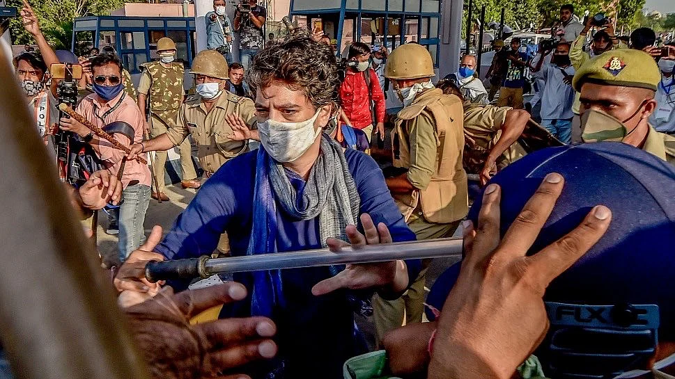 WATCH: Priyanka Gandhi shields Congress worker from lathi charge at DND