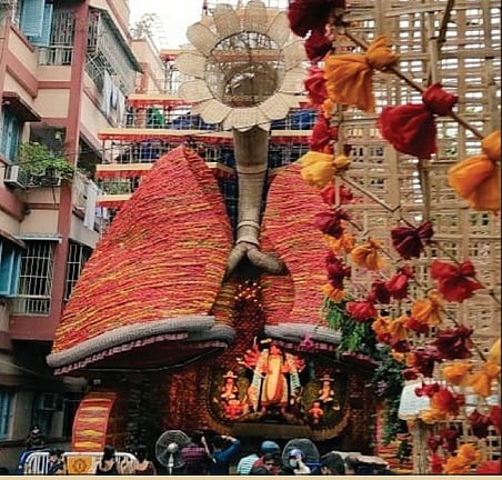 Crowds missing but Kolkata greets ‘Ma Durga’ as caregiver and migrant mother...