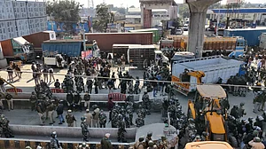 Protest against farm laws: Delhi Police use tear gas, water cannons to push back farmers