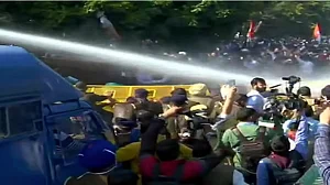 Farm laws: Water cannons used to stop Youth Congress workers from marching to Haryana CM’s home