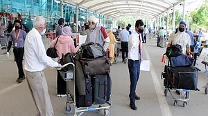 Fresh COVID-19 strain in UK: 262 passengers, 10 crew members stuck at Amritsar airport, relatives protest