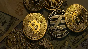Bitcoin turns 12, crosses $34K for first time