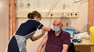 UK begins Oxford/AstraZeneca COVID-19 vaccine rollout with dialysis patient