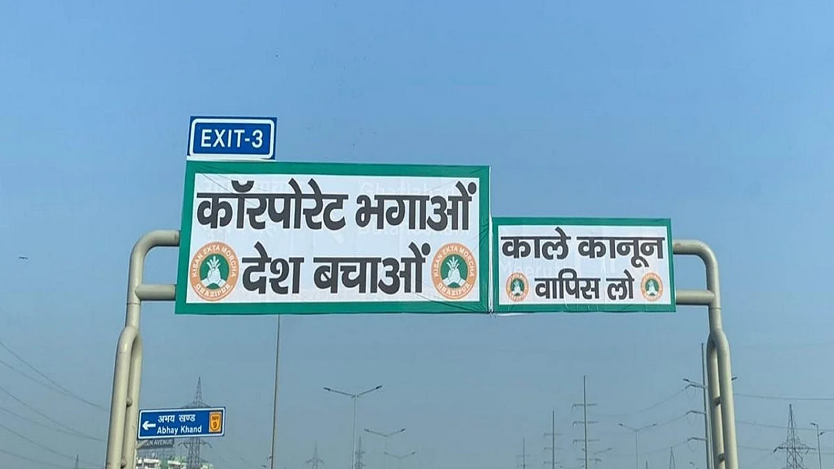 Protesting farmers affix ‘black laws’ banners on NH signboards