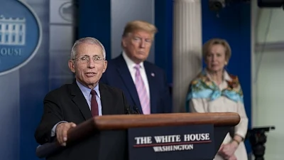 America’s top infectious disease expert Dr Anthony Fauci (left) with former US President Trump (right) (IANS Photo)