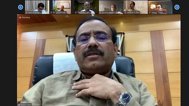 Maharashtra Health Minister Rajesh Tope attends a virtual meeting called by CM Uddhav Thackeray to discuss the Covid situation in the state on Sunday (Photo: Twitter/@PBNS_India)