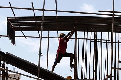 Crores of construction workers reel under misery even as Centre takes measures that go against their interests