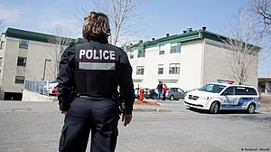 A police officer stands guard in Canada amid heightened security.