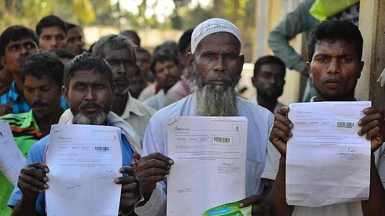 People show their documents during NRC exercise in Assam