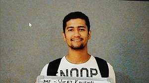 In the picture, Vicky is seen holding an audition whiteboard wearing a white T-shirt.