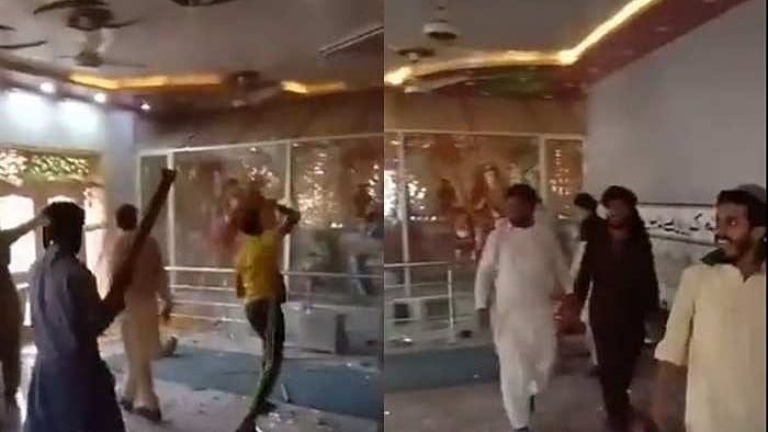 Hundreds of people, carrying sticks, stones and bricks attacked the temple