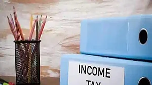 Is there a limit in income tax laws up to which a father can gift to his son