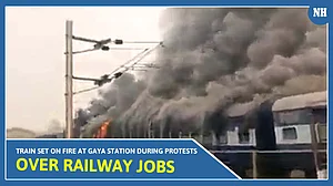 Train set on fire at Gaya station during protests over railway jobs | Video