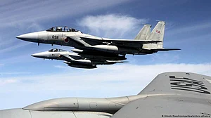 Japan urges China to stop flying fighter jets too close to Japanese military aircraft