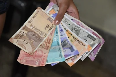 Falling rupee a symptom: Weakening economy is the disease