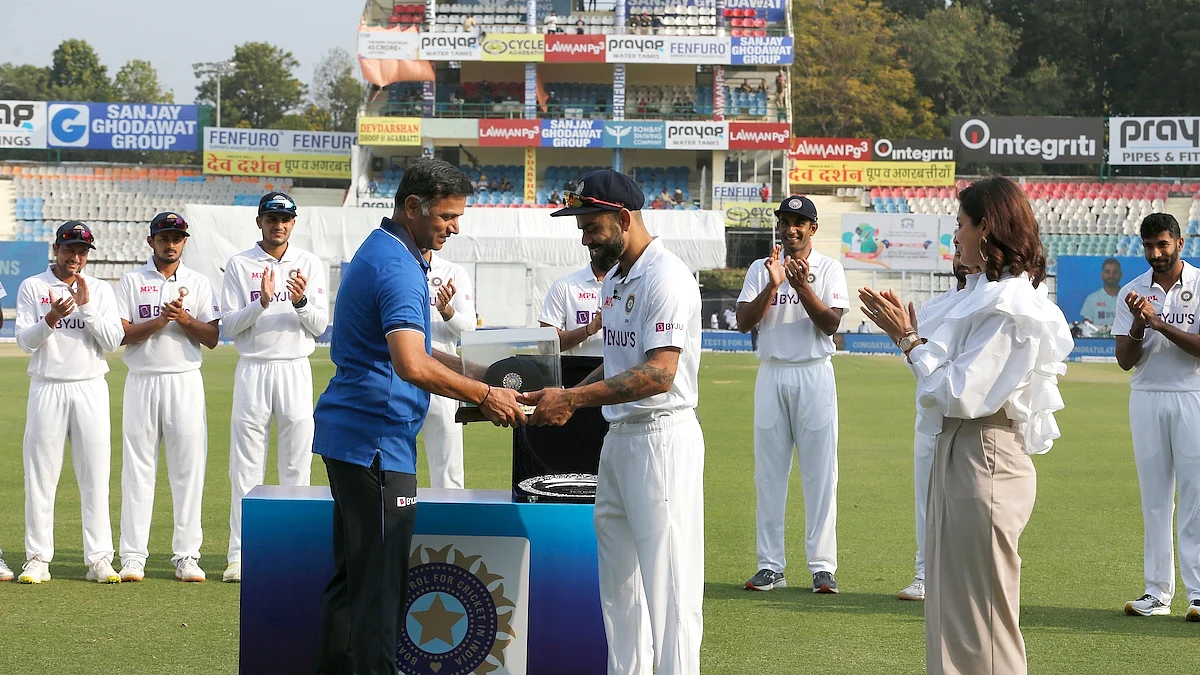 Dravid felicitating Kohli