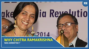 Why Chitra Ramakrishna was arrested?