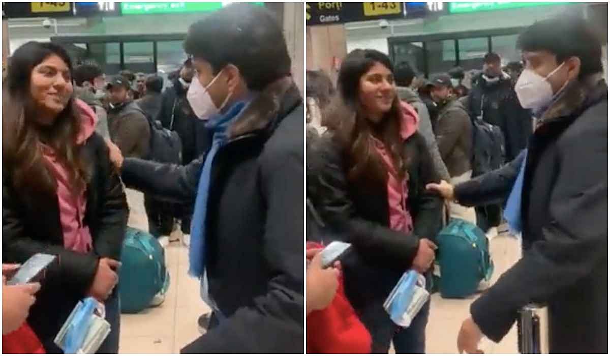 In this viral video grab, Union Minister Jyotiraditya Scindia is seen repeatedly touching a girl student coming back from Ukraine