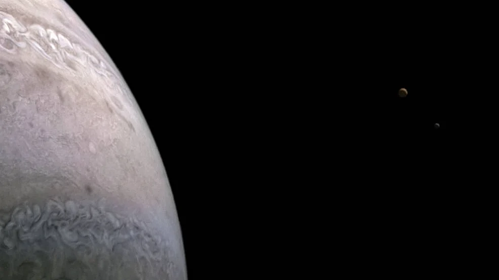 NASA spacecraft snaps images of Jupiter's moons Io, Europa