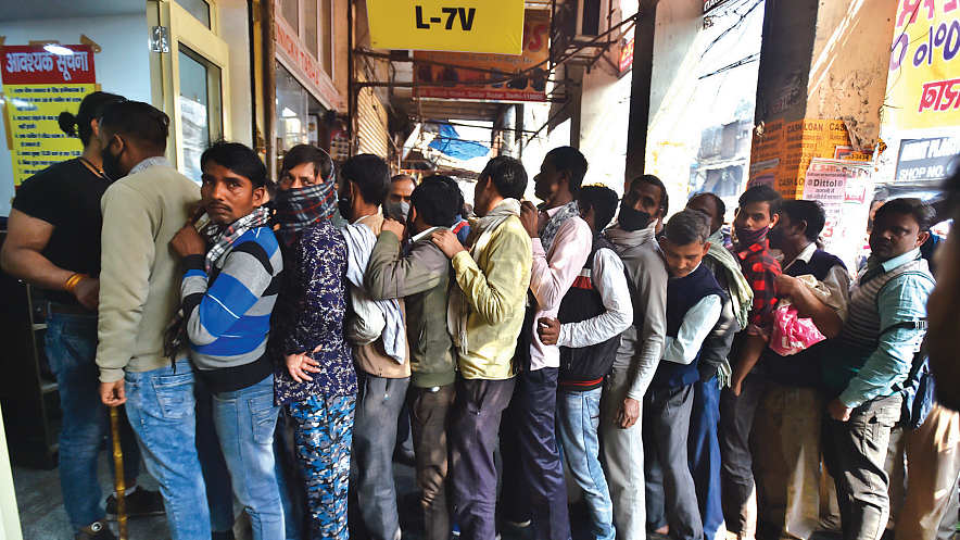 Long queues outside a liquor shop in Delhi