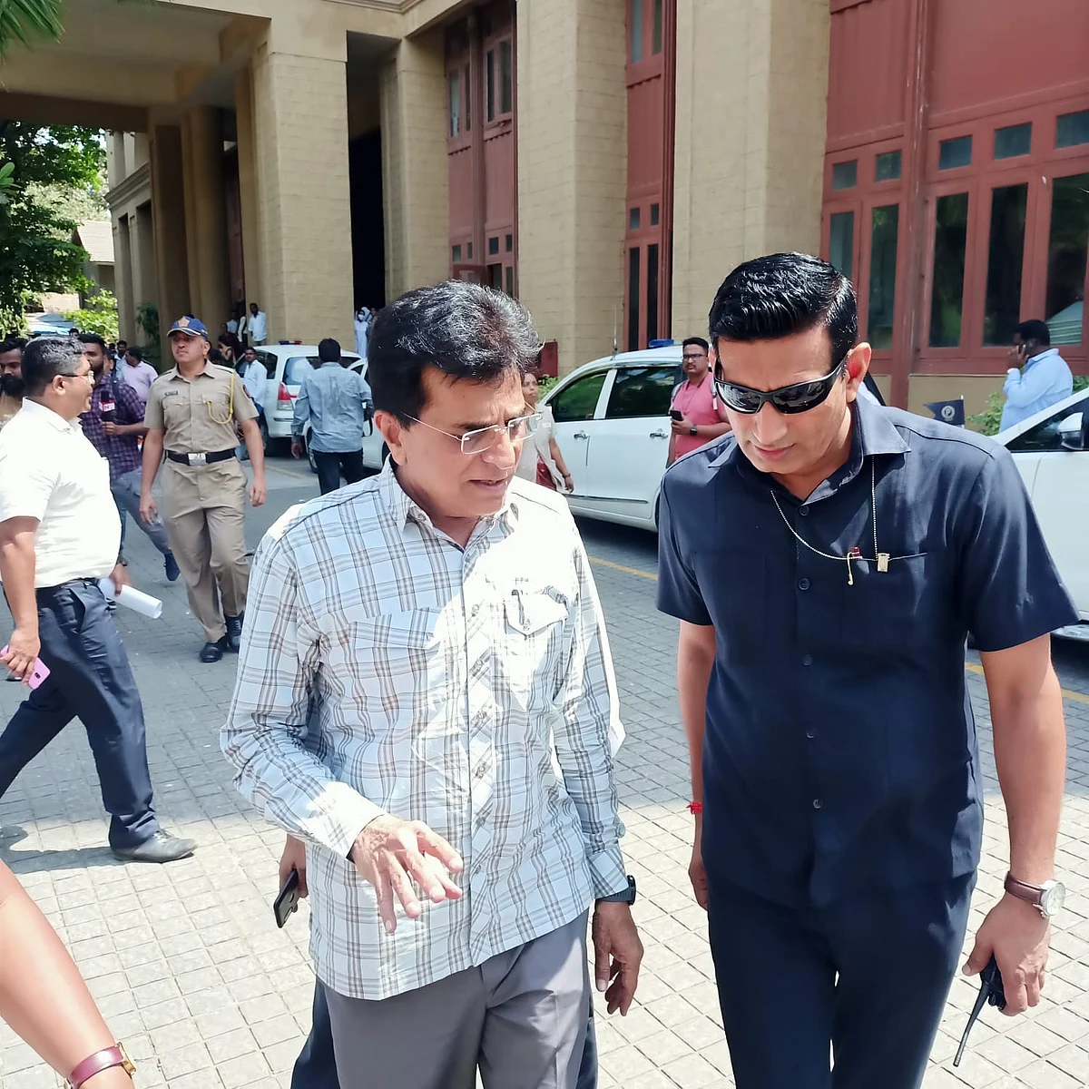 Somaiya (left) leaving the EOW headquarters after appearing for inquiries on Monday.