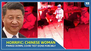 Horrific: Chinese woman pinned down, Covid test done forcibly