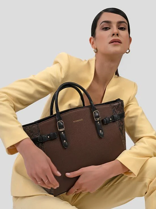 Style a bold handbag to make it a fashion statement