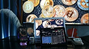 BlockFi, Crypto.com lay off hundreds as digital coins crash