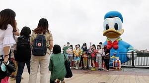 Shanghai Disneyland reopens after Covid-triggered closure