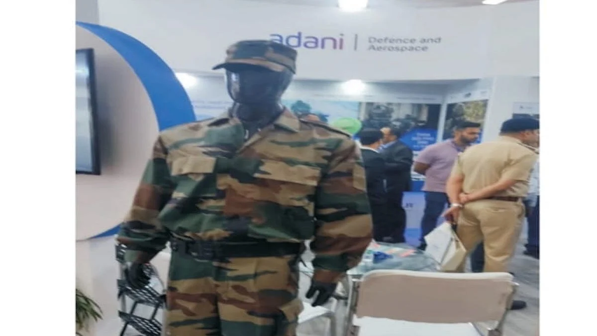 OFB employees demand action against Adani Group for violating Patent Act & showing army uniform at Police Expo