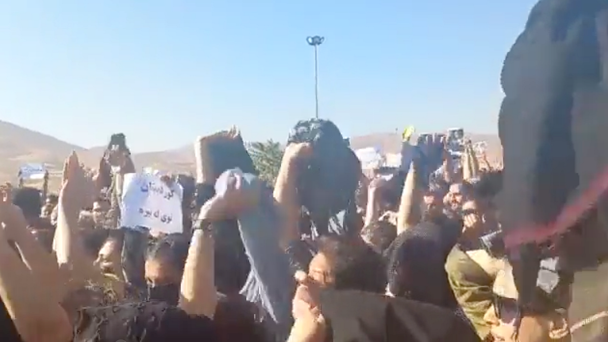 Iranian women protest by removing their scarves against the murder of Mahsa Amini (screengrab from video)