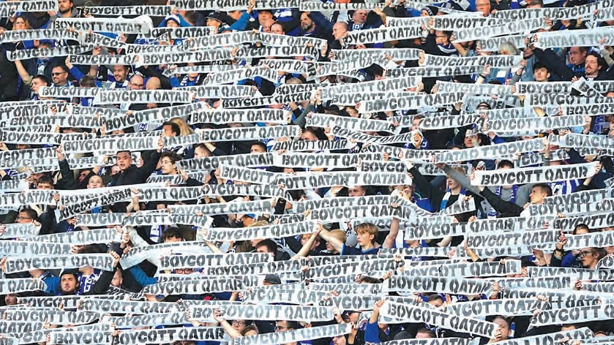 Hertha’s fans demonstrate in Berlin with banners for a boycott of the World Cup in Qatar, 12 November 2022.